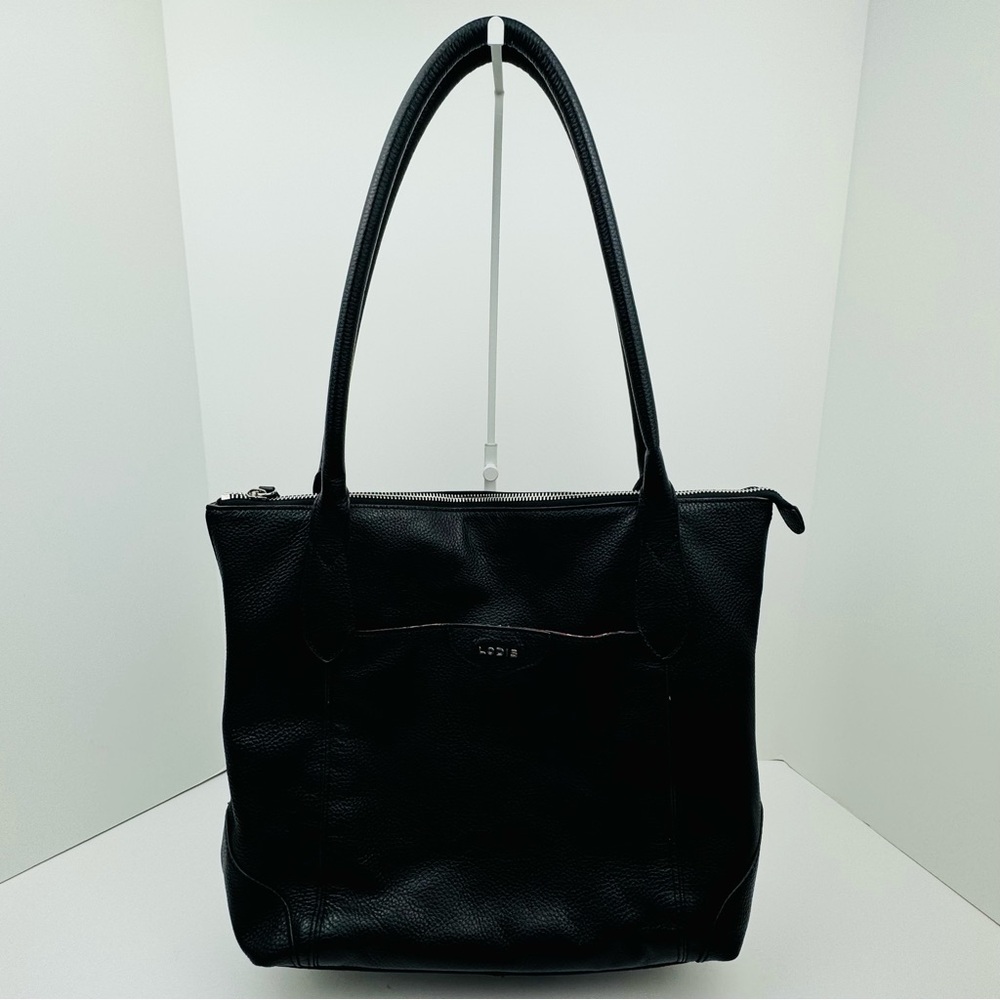 Lodi’s Pebbled Leather Women’s Tote Shoulder Travel Bag in black. Metal feet.